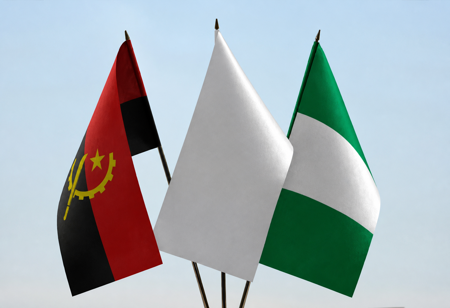 The flags of Angola and Nigeria standing side by side