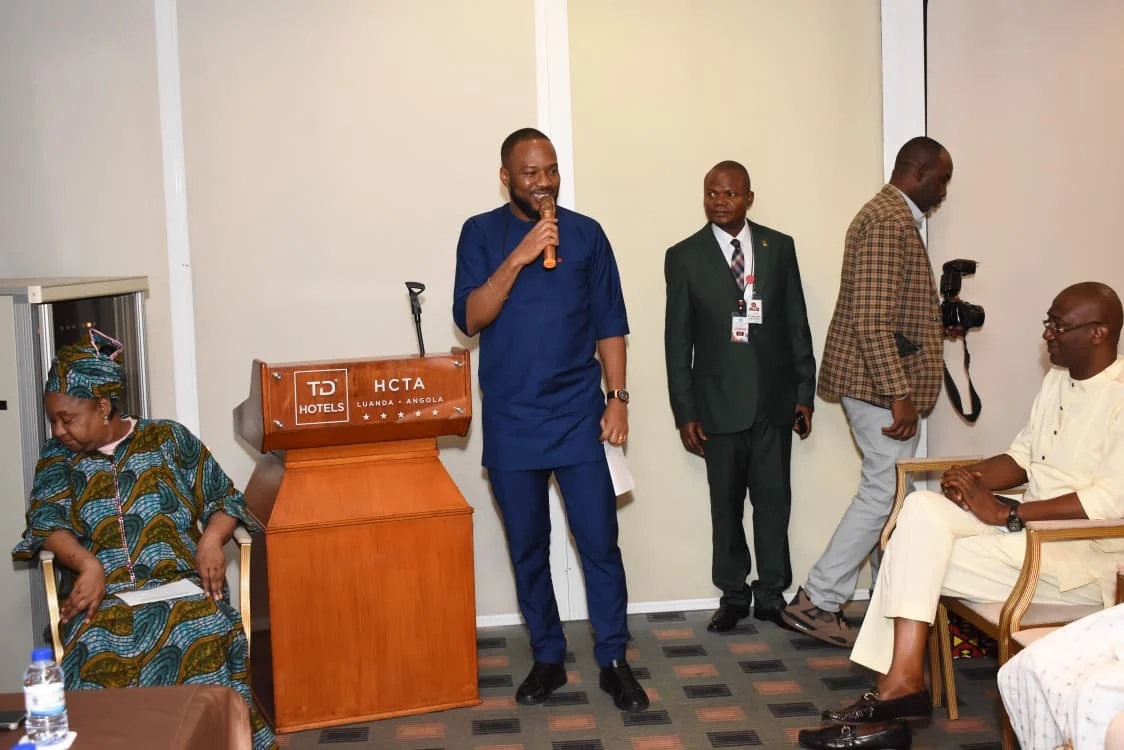Speaker addressing the gathering beside the HCTA Hotels lectern